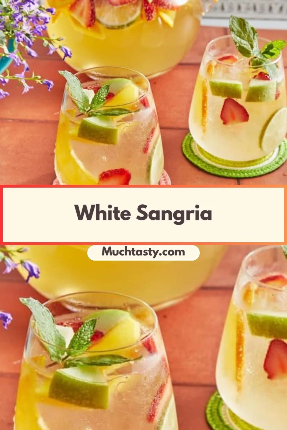 A refreshing glass of White Sangria filled with fruits and ice.